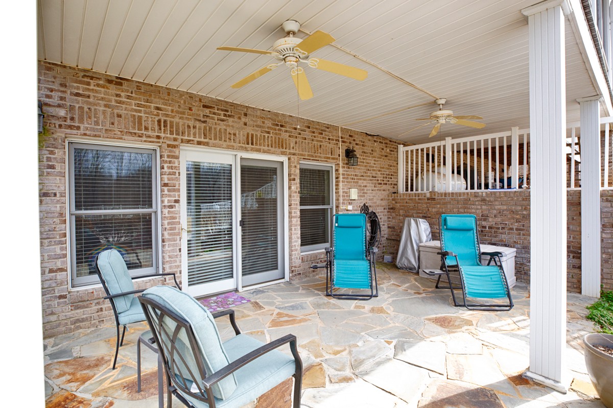 18789 Wells Road Athens, AL 35613 - Photo 28 of 40 a outdoor space with patio the couch and chairs