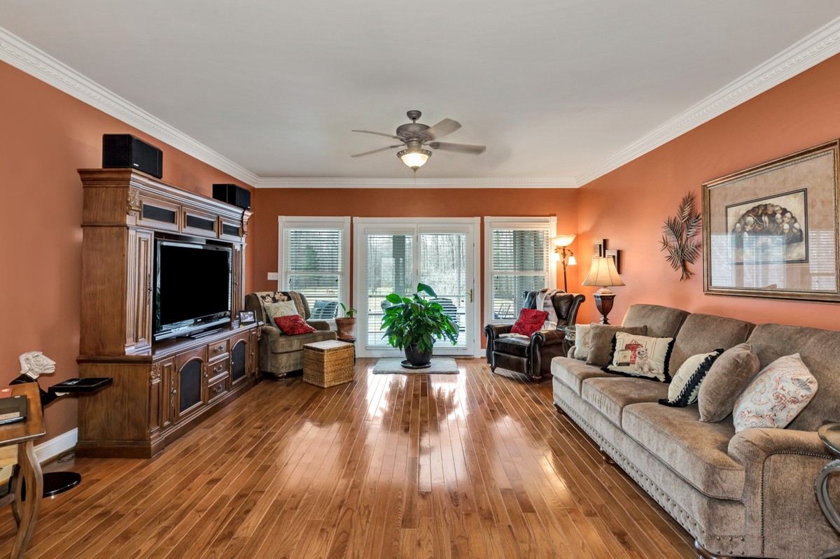 18789 Wells Road Athens, AL 35613 - Photo 6 of 40 a living room with furniture and a flat screen tv