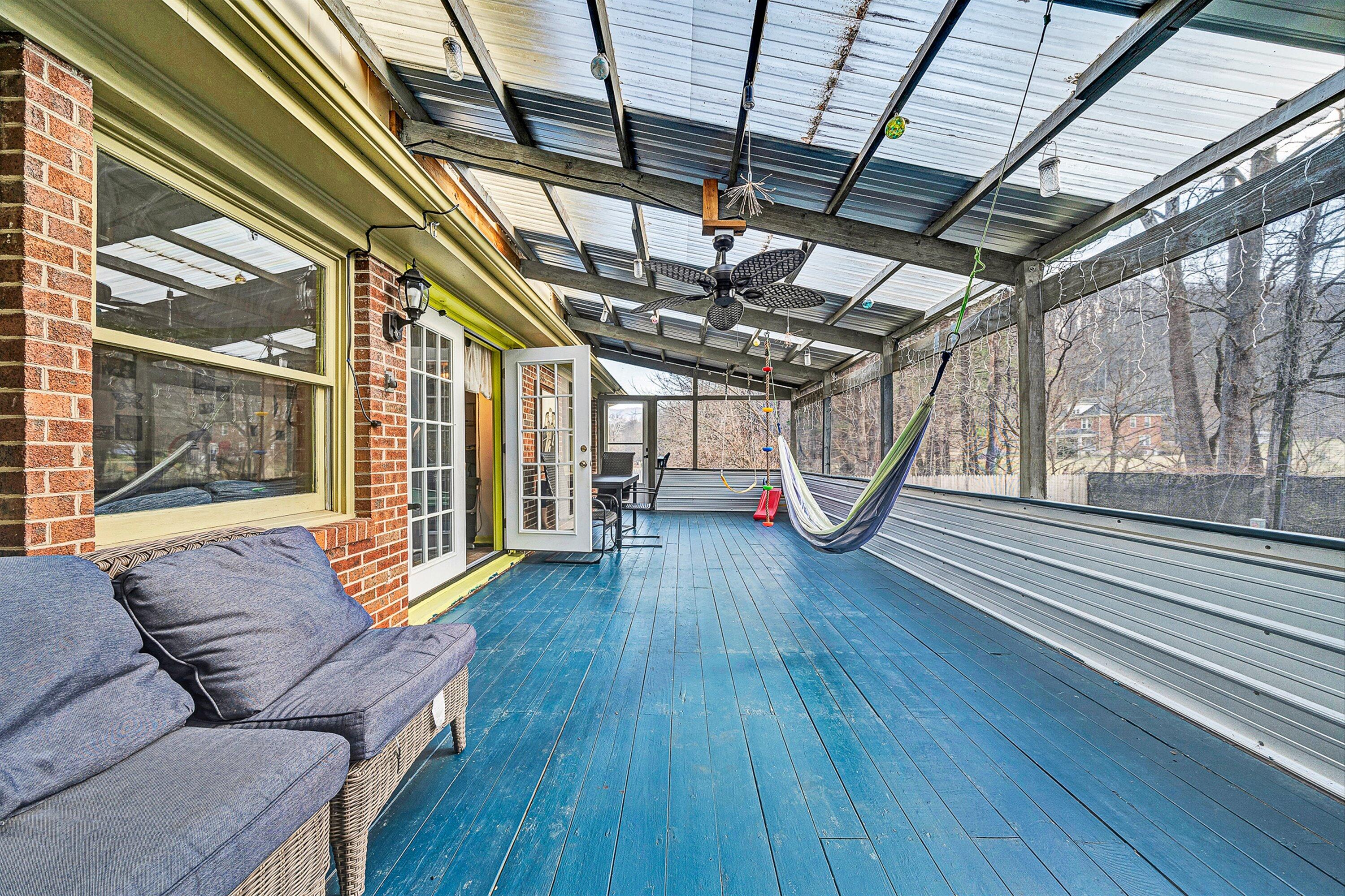 3305 Naff Road Boones Mill, VA 24065 - Photo 17 of 57 a living room with wooden floors and furniture