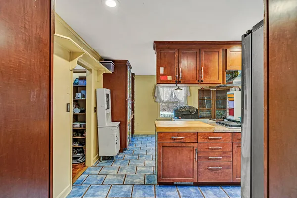a room with furniture and cabinets