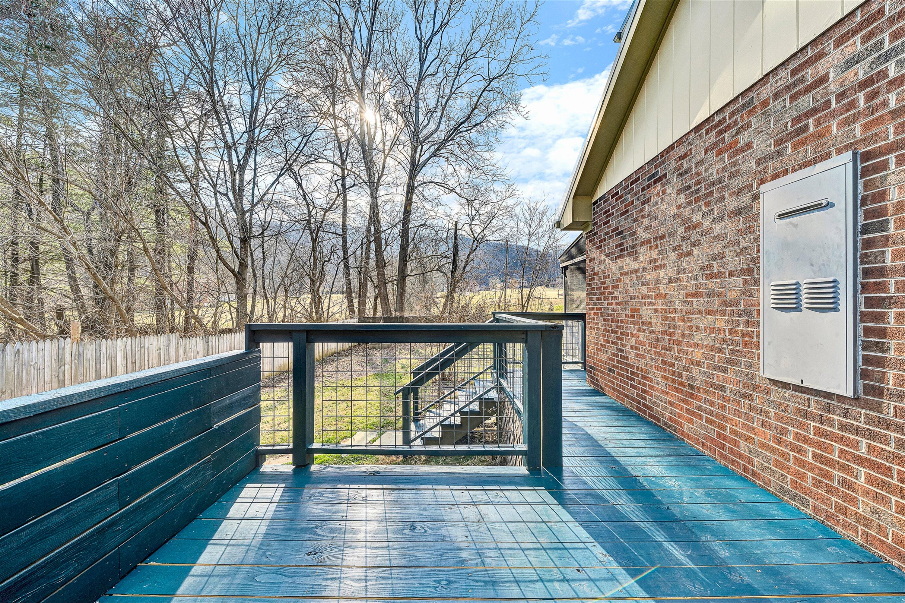 3305 Naff Road Boones Mill, VA 24065 - Photo 40 of 57 a view of porch with wooden floor and fence
