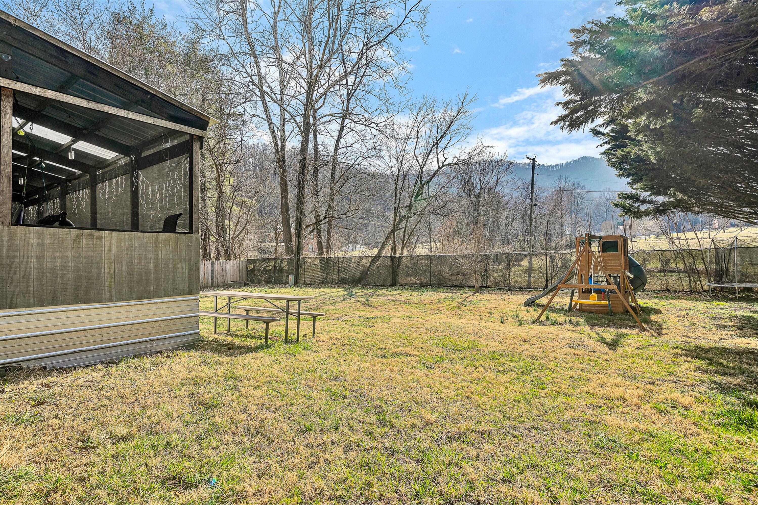 3305 Naff Road Boones Mill, VA 24065 - Photo 45 of 57 a view of backyard with swimming pool and sitting area