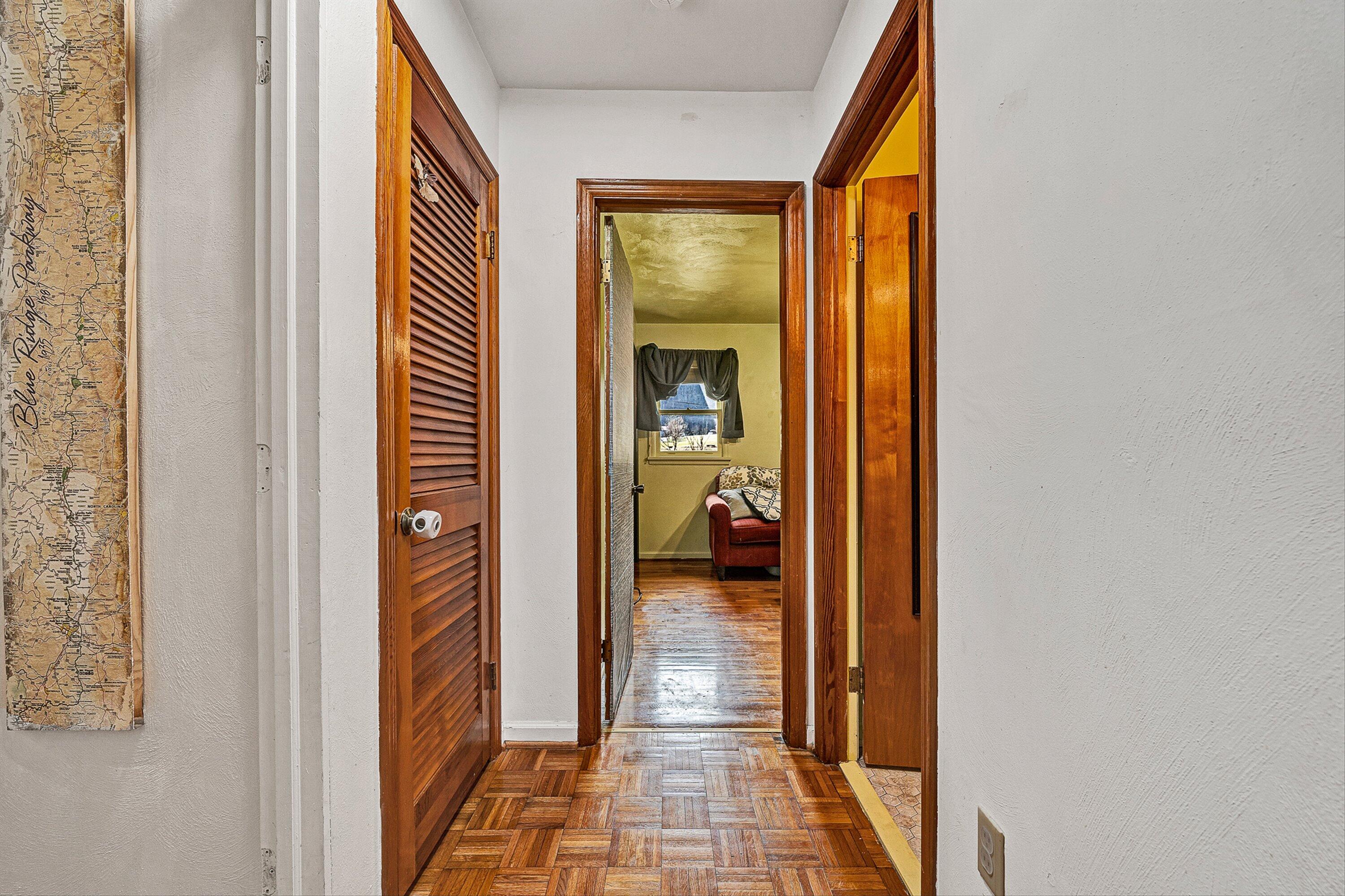 3305 Naff Road Boones Mill, VA 24065 - Photo 7 of 57 a view of a hallway with a livingroom and a bathroom