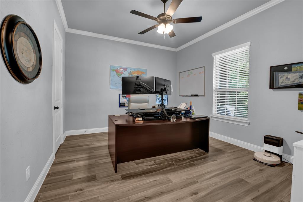 305 Familia Court Azle, TX 76020 - Photo 23 of 40 a living room with furniture and a flat screen tv