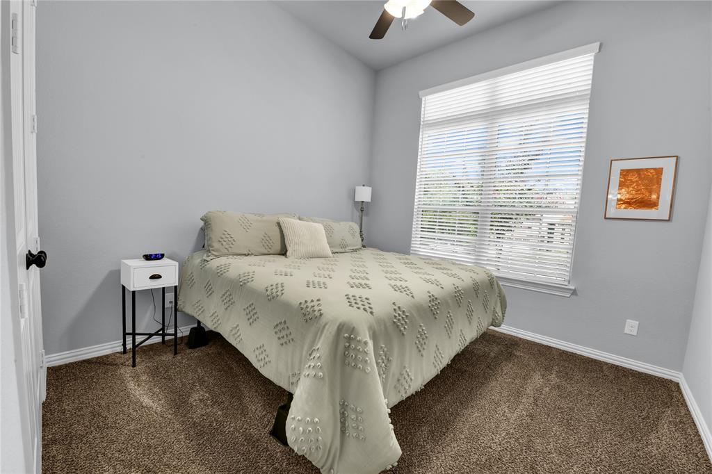 305 Familia Court Azle, TX 76020 - Photo 26 of 40 a bedroom with a bed and a window