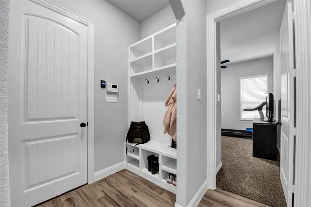 a living room with furniture and window