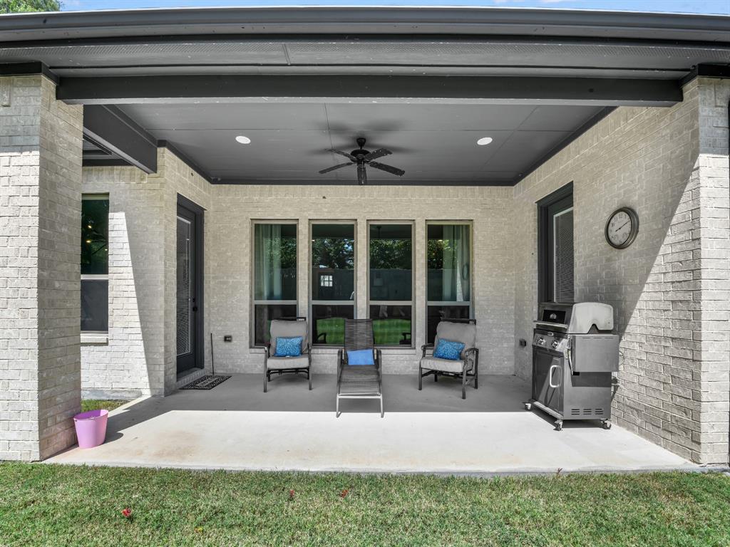 305 Familia Court Azle, TX 76020 - Photo 32 of 40 a living room with furniture and window