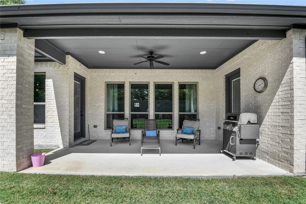 305 Familia Court Azle, TX 76020 - Photo 39 of 40 a living room with furniture and window