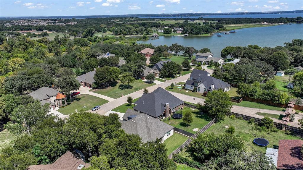305 Familia Court Azle, TX 76020 - Photo 5 of 40 an aerial view of a house with a lake view