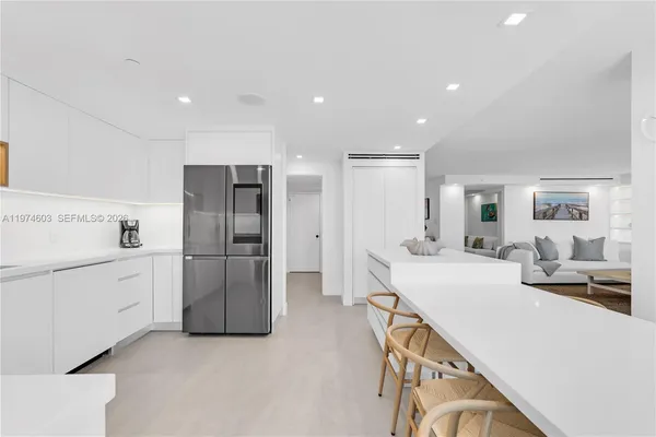 a view of storage and utility room with washer and dryer