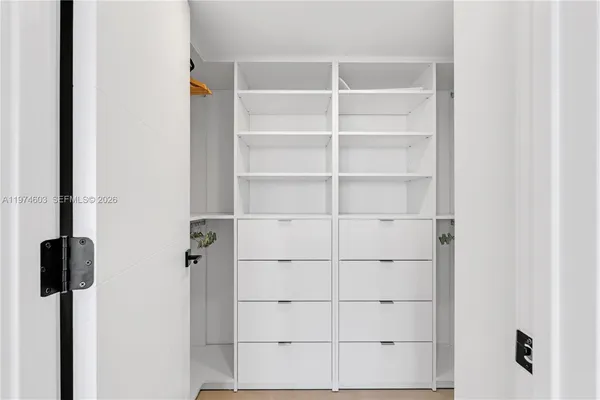 a bathroom with a double vanity sink mirror and double