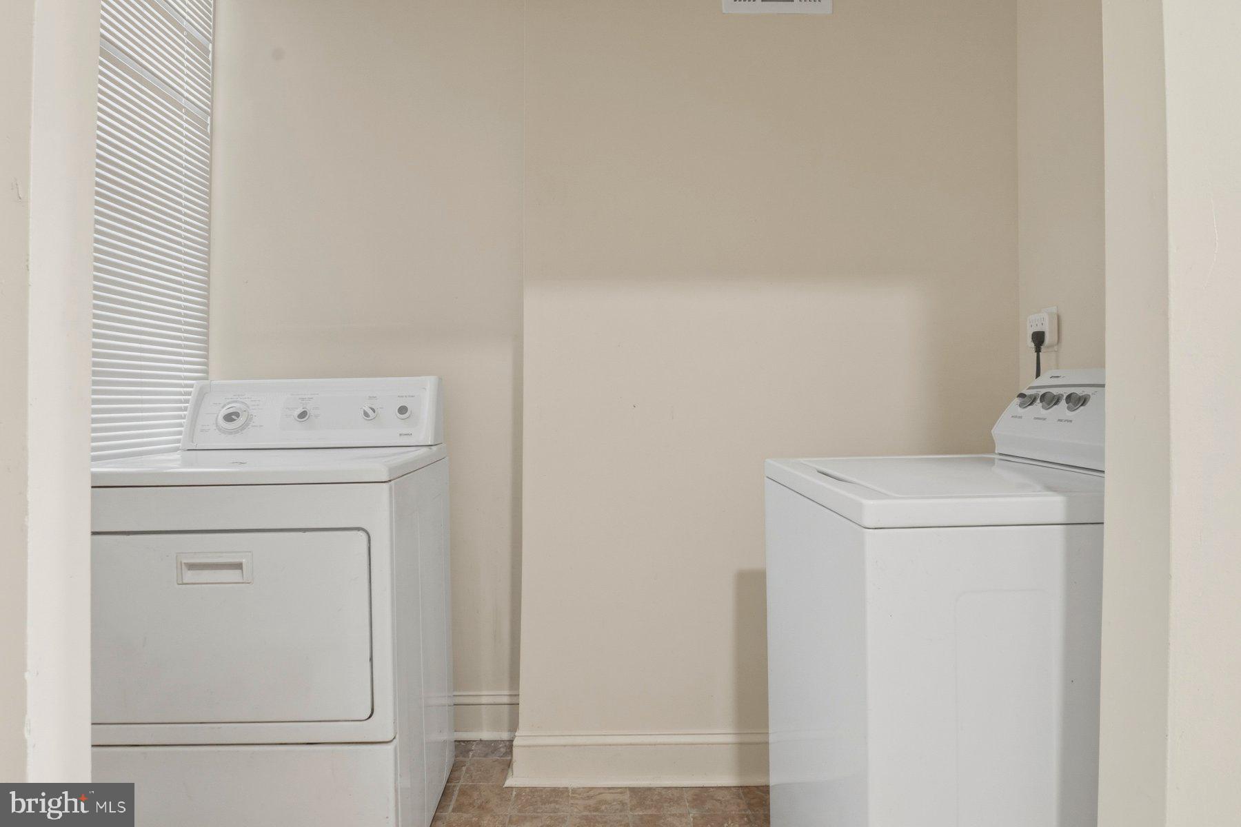 322 South Pulaski Street Baltimore, MD 21223 - Photo 18 of 28 a utility room with dryer and washer