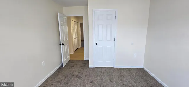an empty room with closet