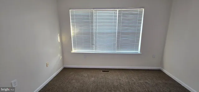 a view of a small space with a window