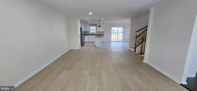 a view of a kitchen with a sink