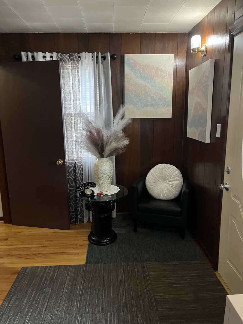 3331 West 64th Street Chicago, IL 60629 - Photo 2 of 15 a living room with furniture and a large window