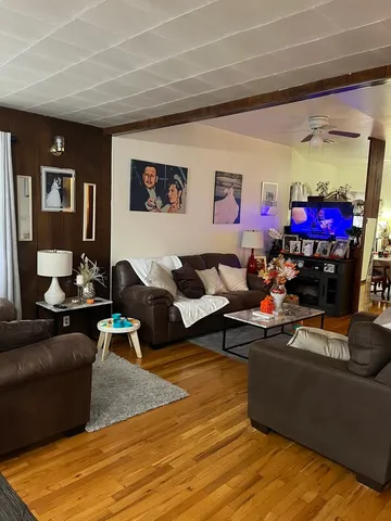 a living room with furniture and a couch