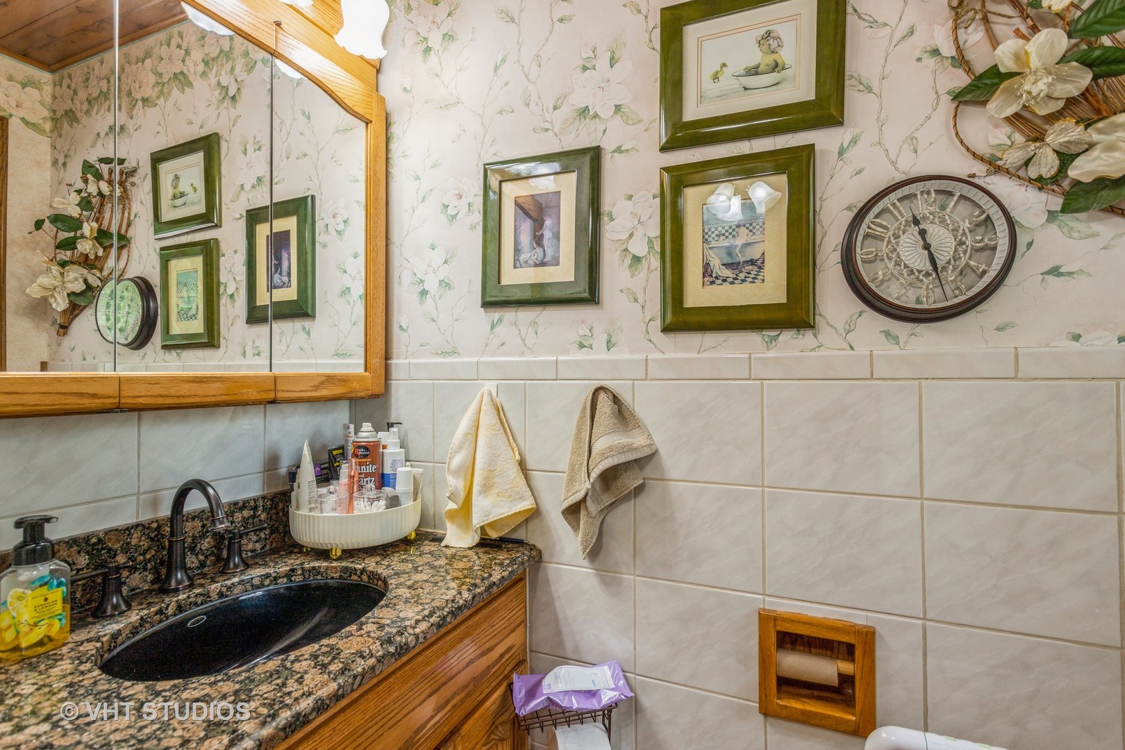 14119 West Maple Road Mokena, IL 60448 - Photo 24 of 47 a kitchen with a stove and a wooden cabinets