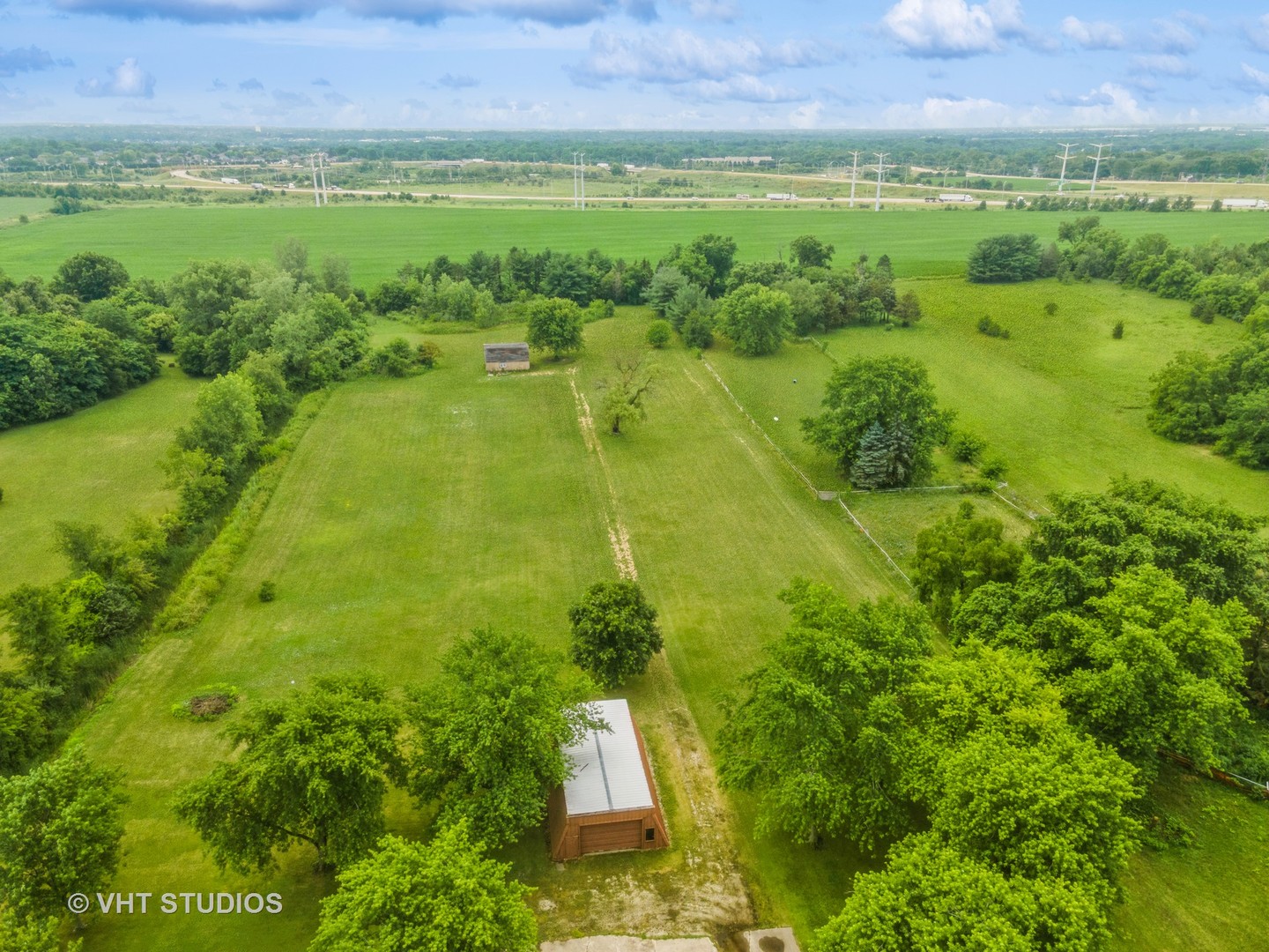 14119 West Maple Road Mokena, IL 60448 - Photo 36 of 47 a view of a lake with a yard