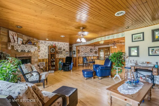 a living room with furniture and a table