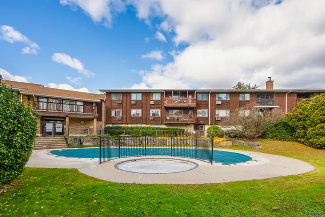 a view of a house with a swimming pool