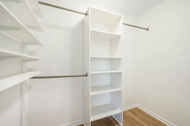 a view of an empty walk in closet