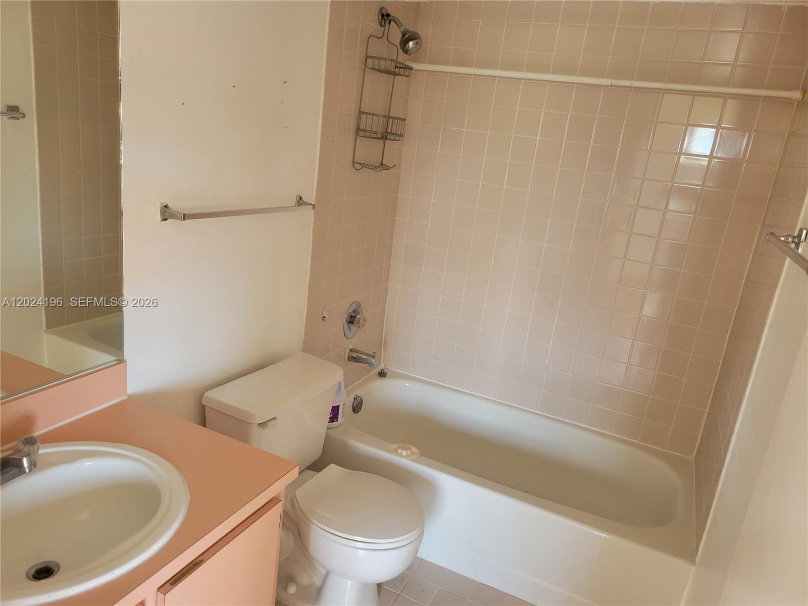 8260 Southwest 210th Street, Unit 319 Cutler Bay, FL 33189 - Photo 20 of 20 a bathroom with a sink toilet and shower