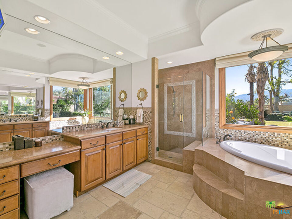 72733 Verbenia Road Rancho Mirage, CA 92270 - Photo 11 of 33 a large living room with a large window