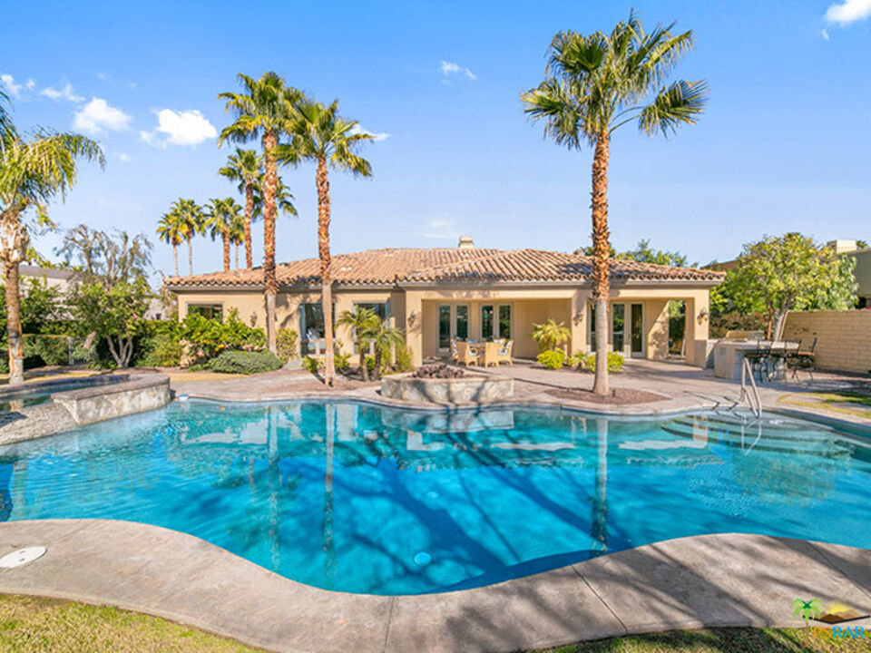 72733 Verbenia Road Rancho Mirage, CA 92270 - Photo 22 of 33 a front view of a house with garden