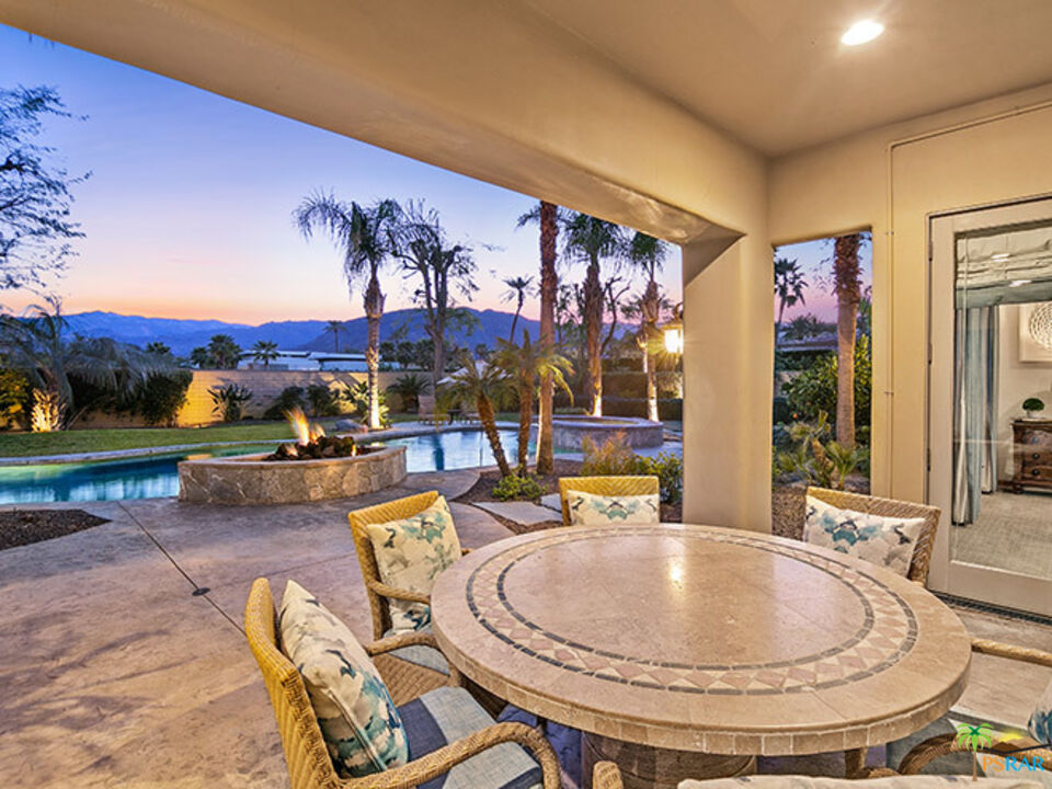 72733 Verbenia Road Rancho Mirage, CA 92270 - Photo 30 of 33 a dinning table and chairs in the patio