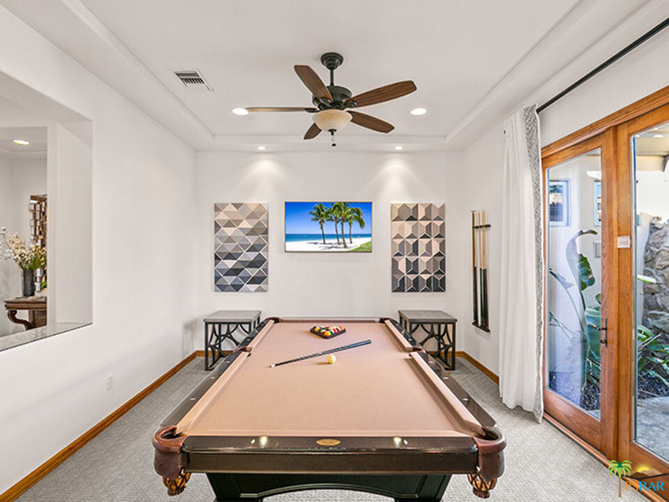 72733 Verbenia Road Rancho Mirage, CA 92270 - Photo 7 of 33 a room with pool table and windows