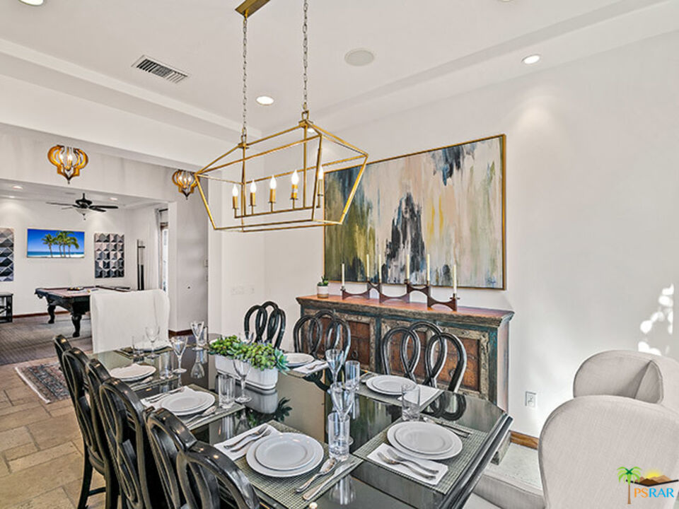 72733 Verbenia Road Rancho Mirage, CA 92270 - Photo 8 of 33 a view of a dining room with furniture