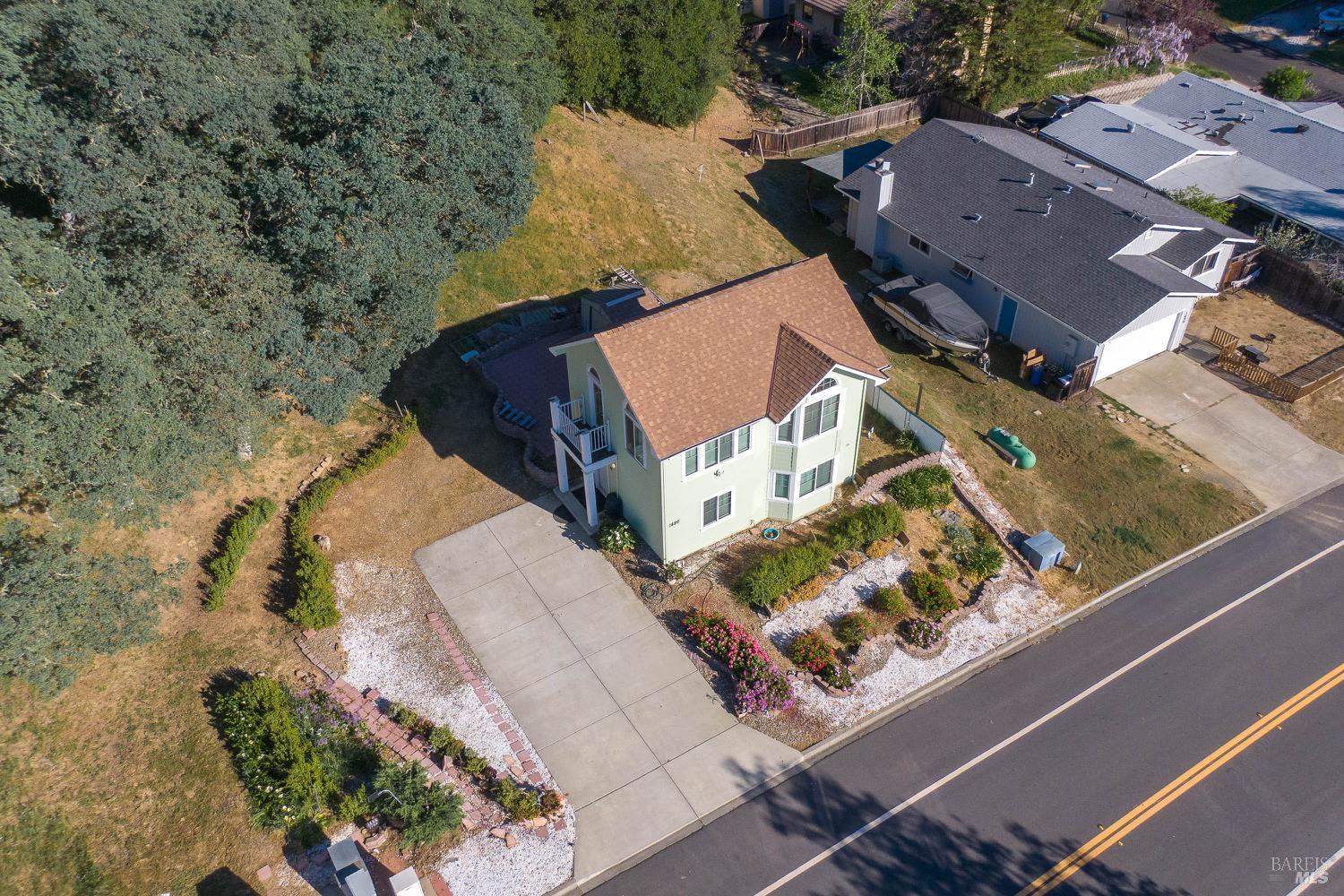 1486 Steele Canyon Road Napa, CA 94558 - Photo 26 of 46 an aerial view of a house with a yard