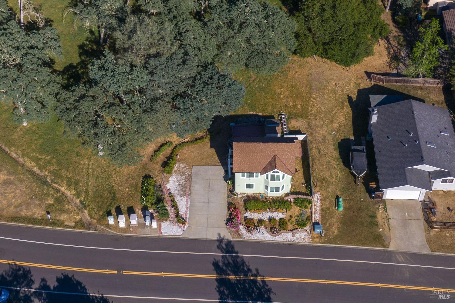 1486 Steele Canyon Road Napa, CA 94558 - Photo 27 of 46 an aerial view of houses with yard