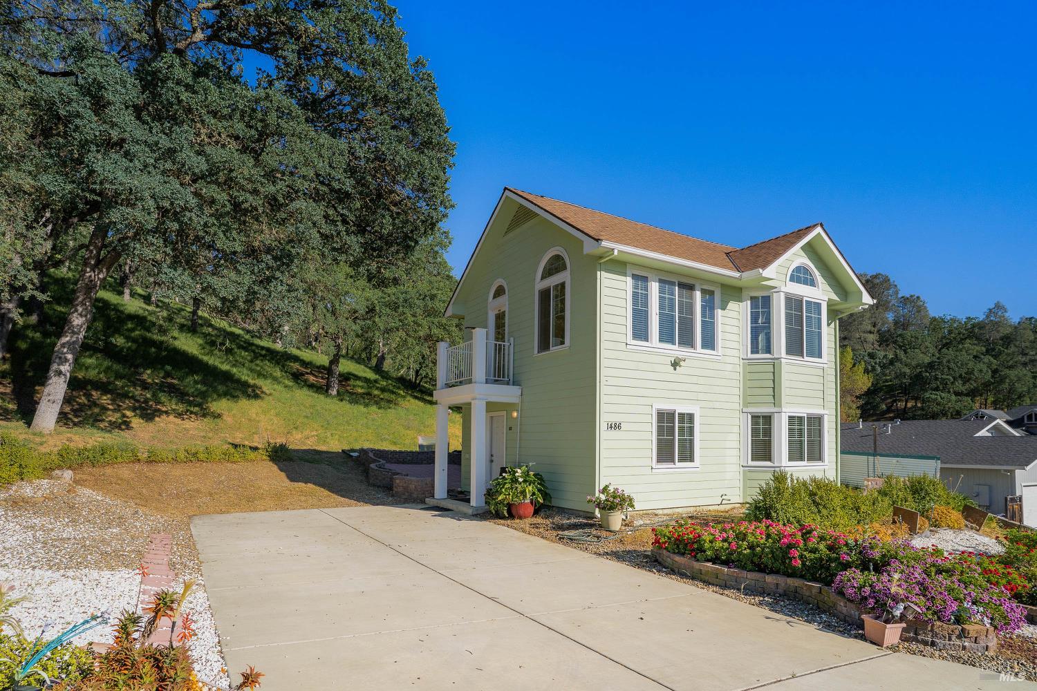 1486 Steele Canyon Road Napa, CA 94558 - Photo 28 of 46 a front view of a house with a yard