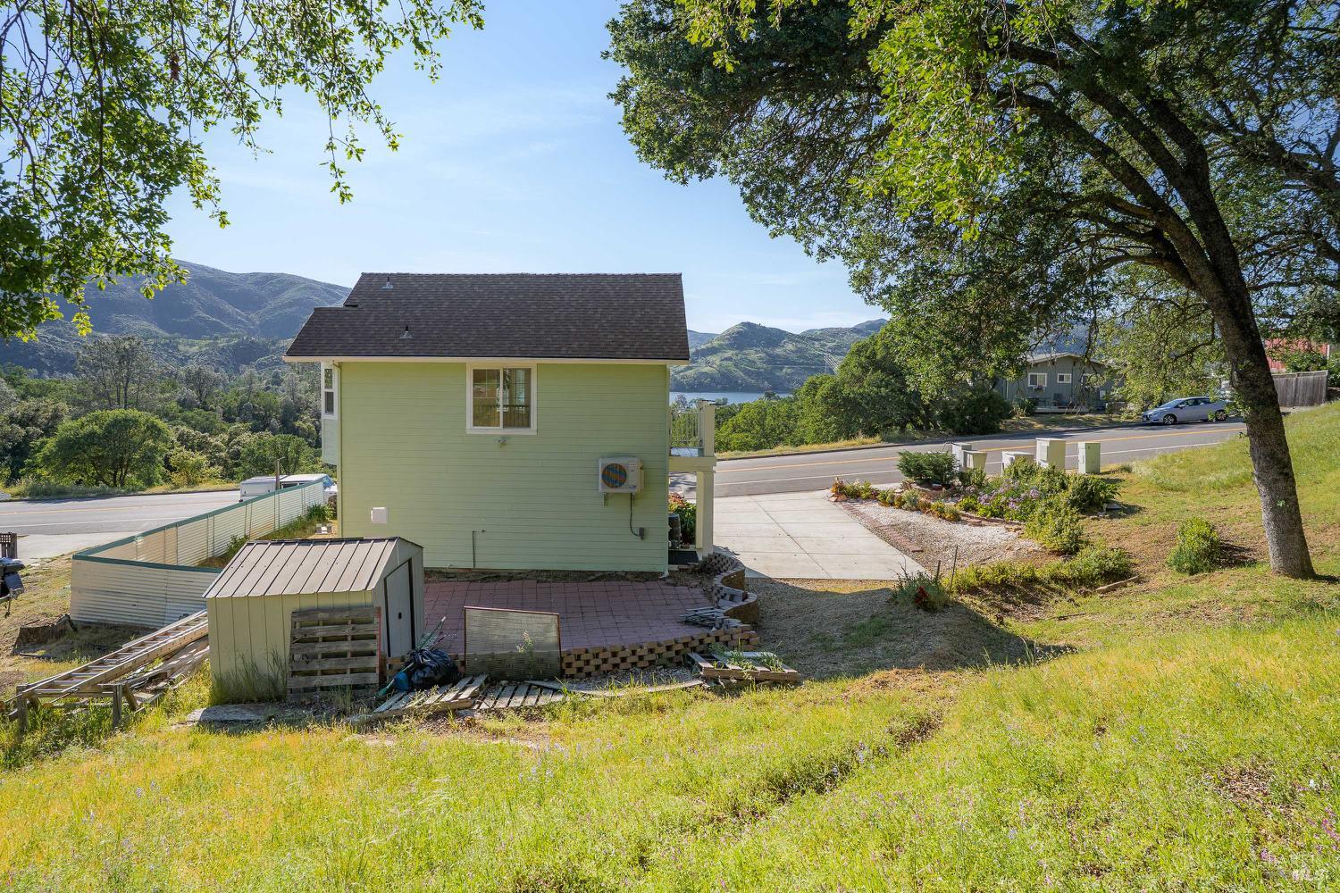 1486 Steele Canyon Road Napa, CA 94558 - Photo 30 of 46 a view of a house with a yard