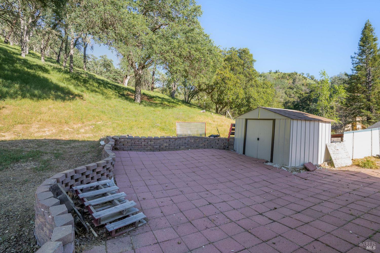1486 Steele Canyon Road Napa, CA 94558 - Photo 31 of 46 a view of a backyard of the house