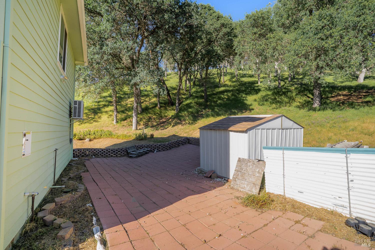 1486 Steele Canyon Road Napa, CA 94558 - Photo 32 of 46 a view of a house with a yard