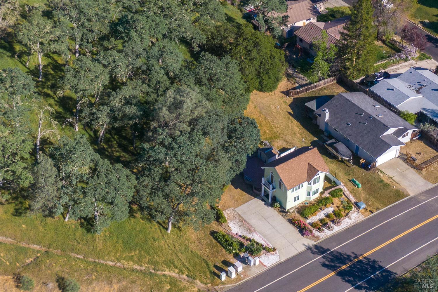 1486 Steele Canyon Road Napa, CA 94558 - Photo 39 of 46 an aerial view of house with yard swimming pool and outdoor seating