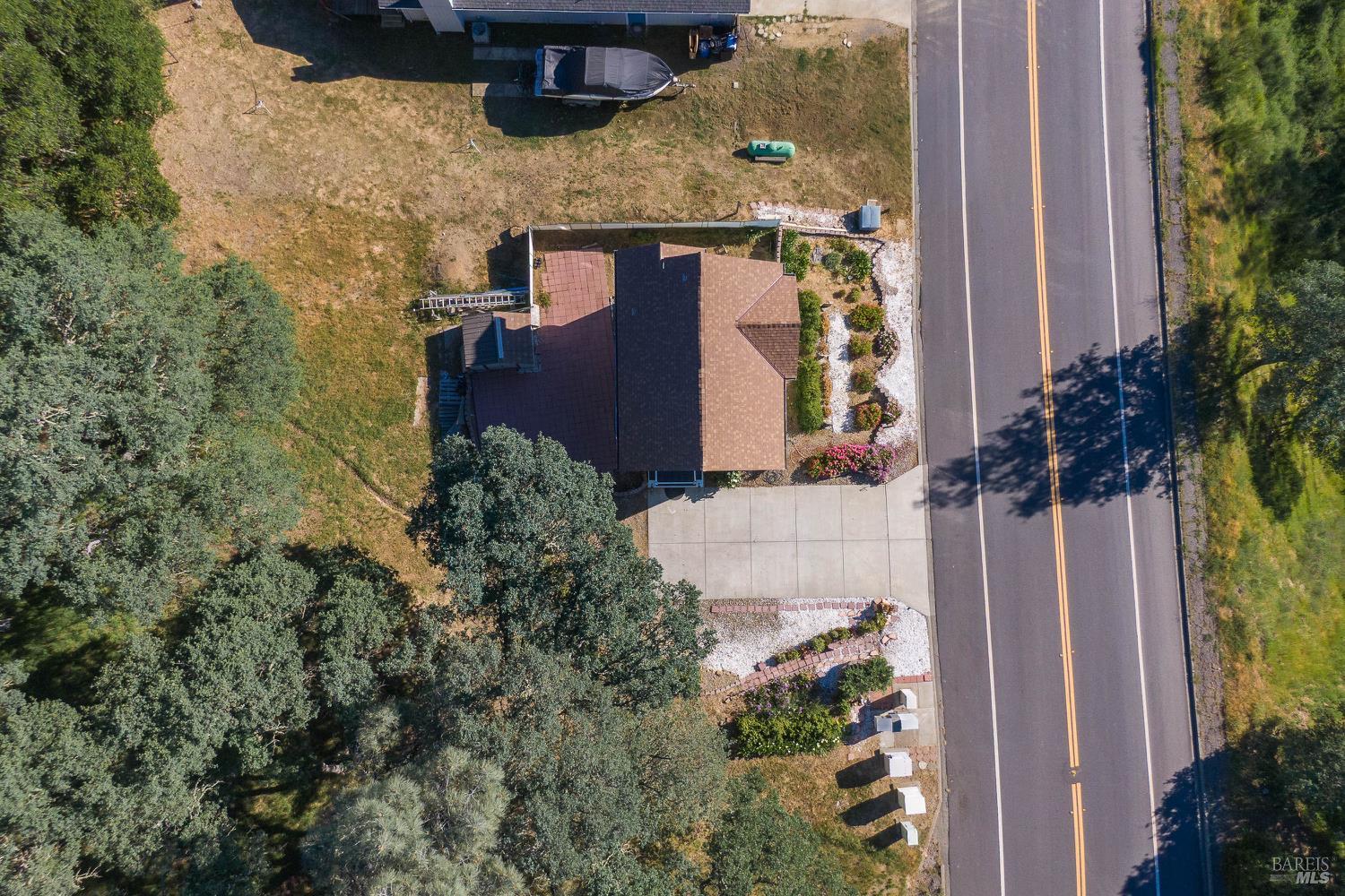 1486 Steele Canyon Road Napa, CA 94558 - Photo 45 of 46 a view of a house with a yard