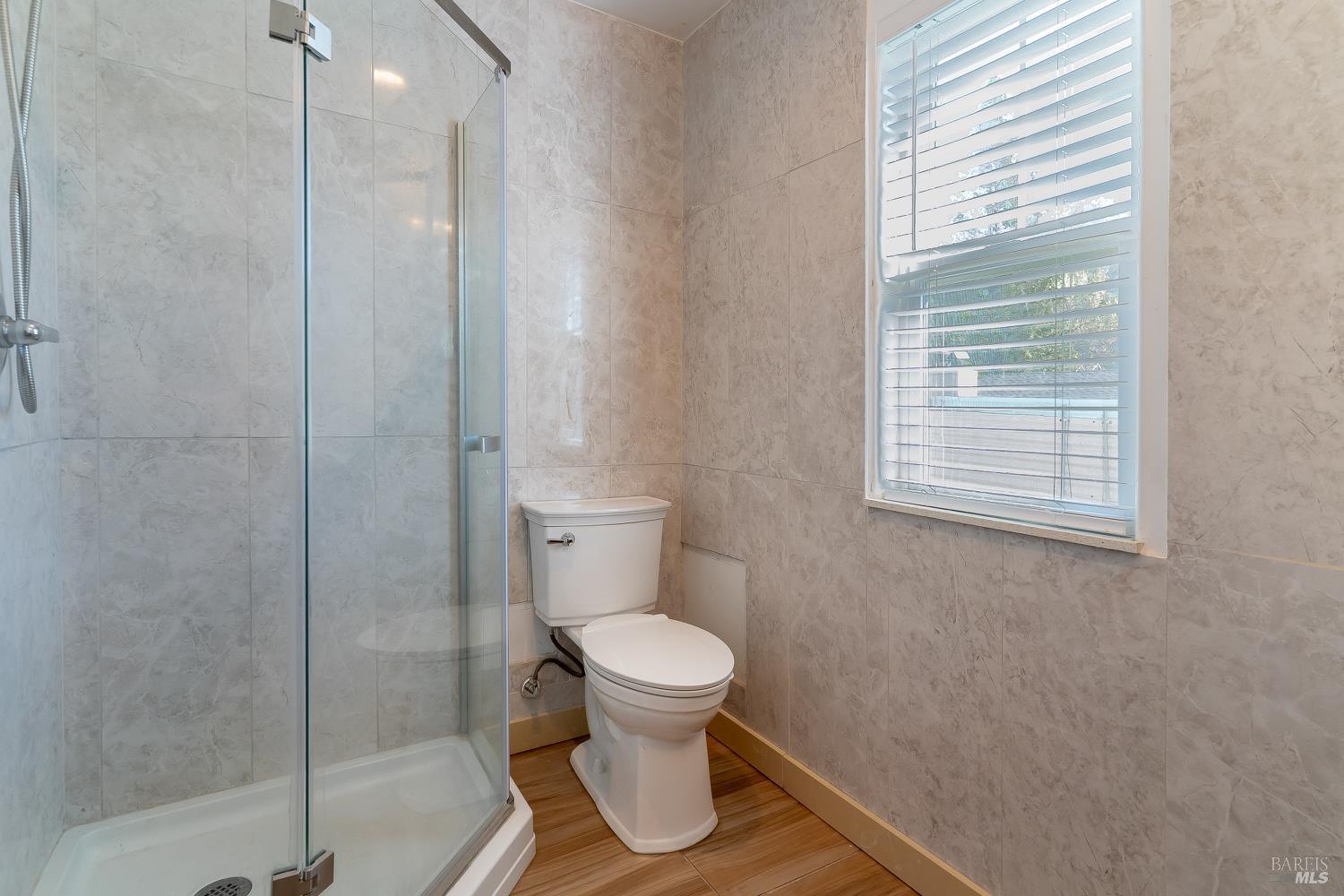 1486 Steele Canyon Road Napa, CA 94558 - Photo 5 of 46 a bathroom with a toilet and a shower