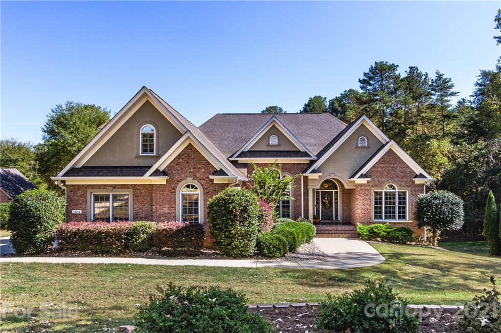 5858 Johnson Road Clover, SC 29710 - Photo 1 of 35 a front view of a house with a yard and garage