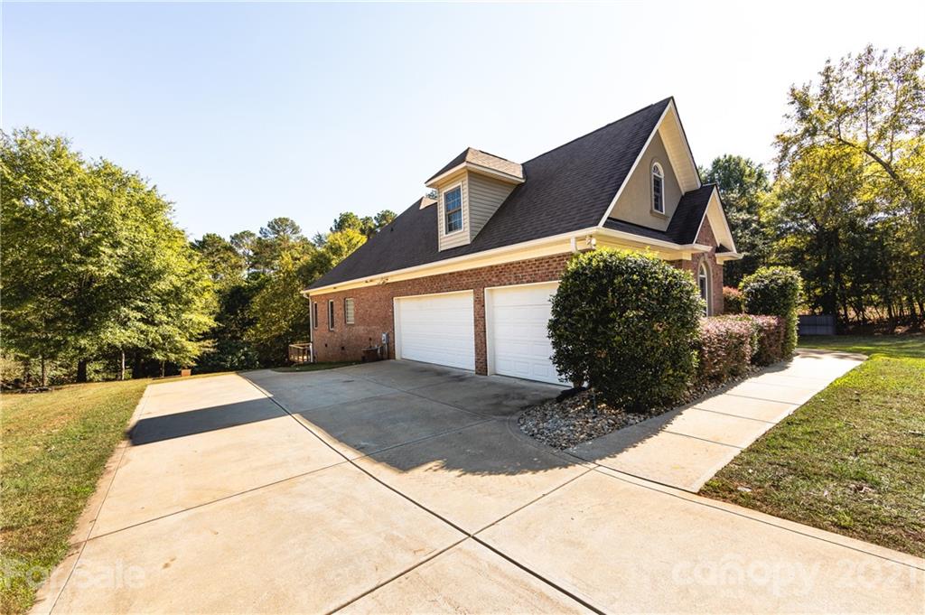 5858 Johnson Road Clover, SC 29710 - Photo 33 of 35 a view of a house with a yard