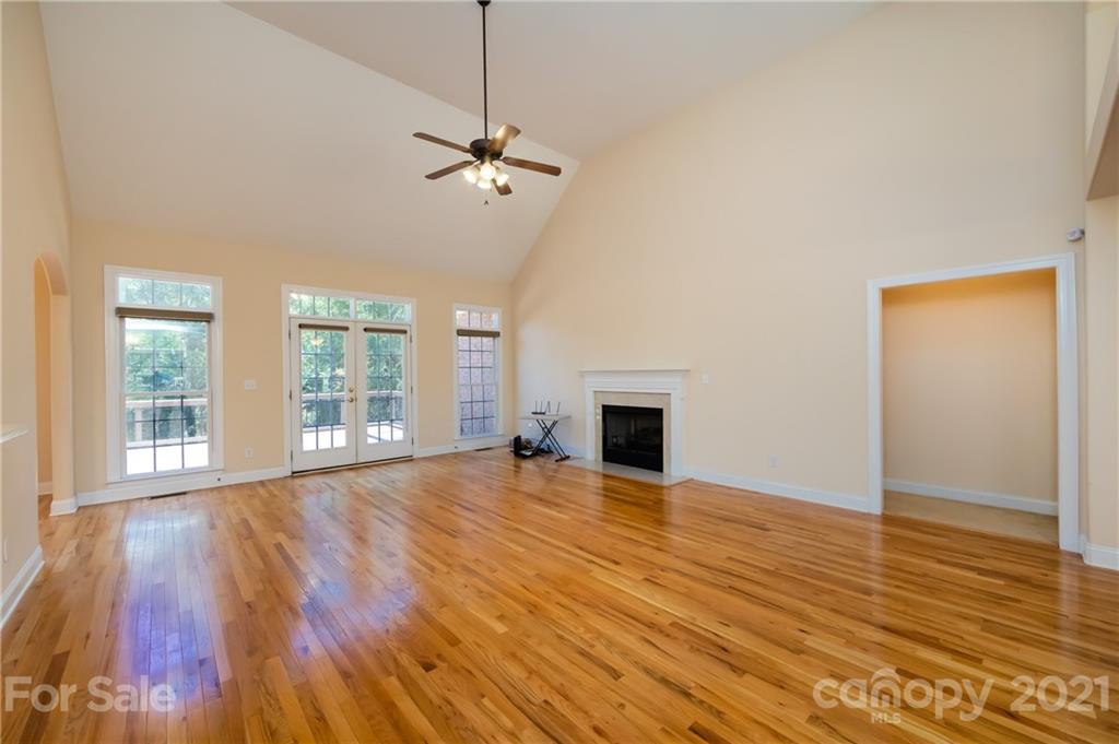 5858 Johnson Road Clover, SC 29710 - Photo 9 of 35 a view of empty room with wooden floor and fireplace