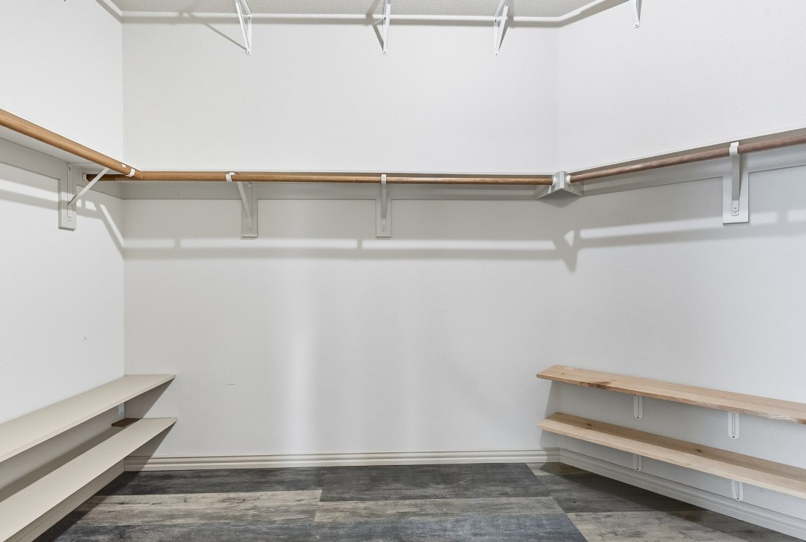2409 Pauma Valley Way Pflugerville, TX 78660 - Photo 21 of 37 Spacious closet with dark wood-style flooring