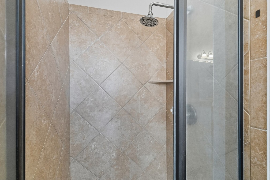 2409 Pauma Valley Way Pflugerville, TX 78660 - Photo 22 of 37 Bathroom view of a stall shower