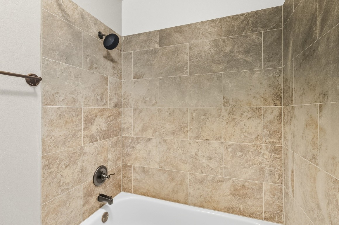 2409 Pauma Valley Way Pflugerville, TX 78660 - Photo 30 of 37 Bathroom featuring shower / tub combination