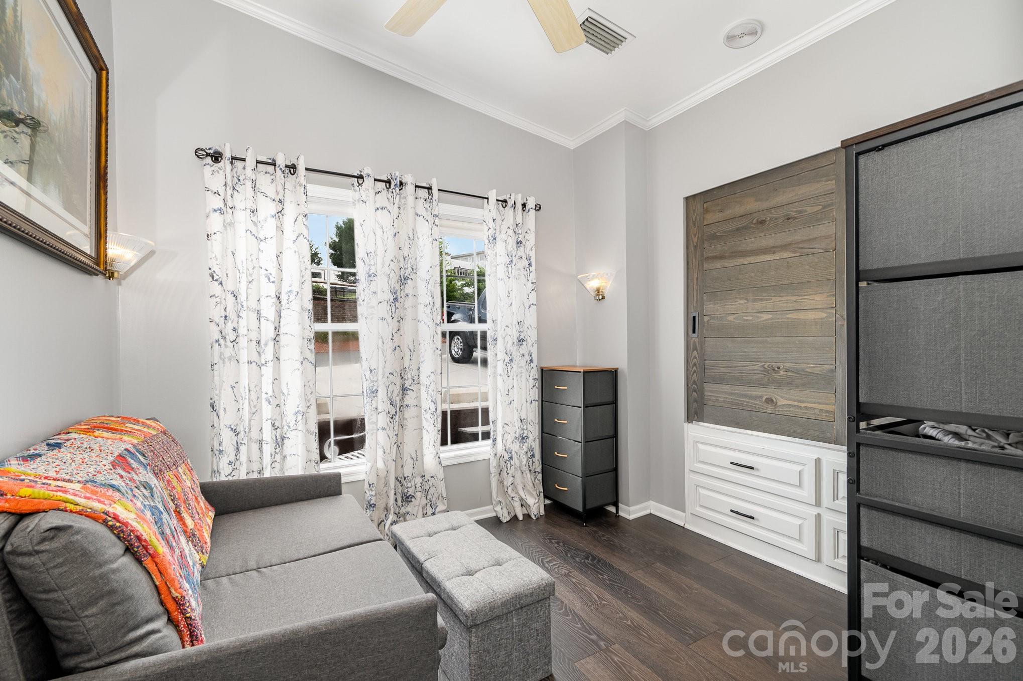 141 Badin Lake Road New London, NC 28127 - Photo 15 of 47 a bedroom with furniture and a closet