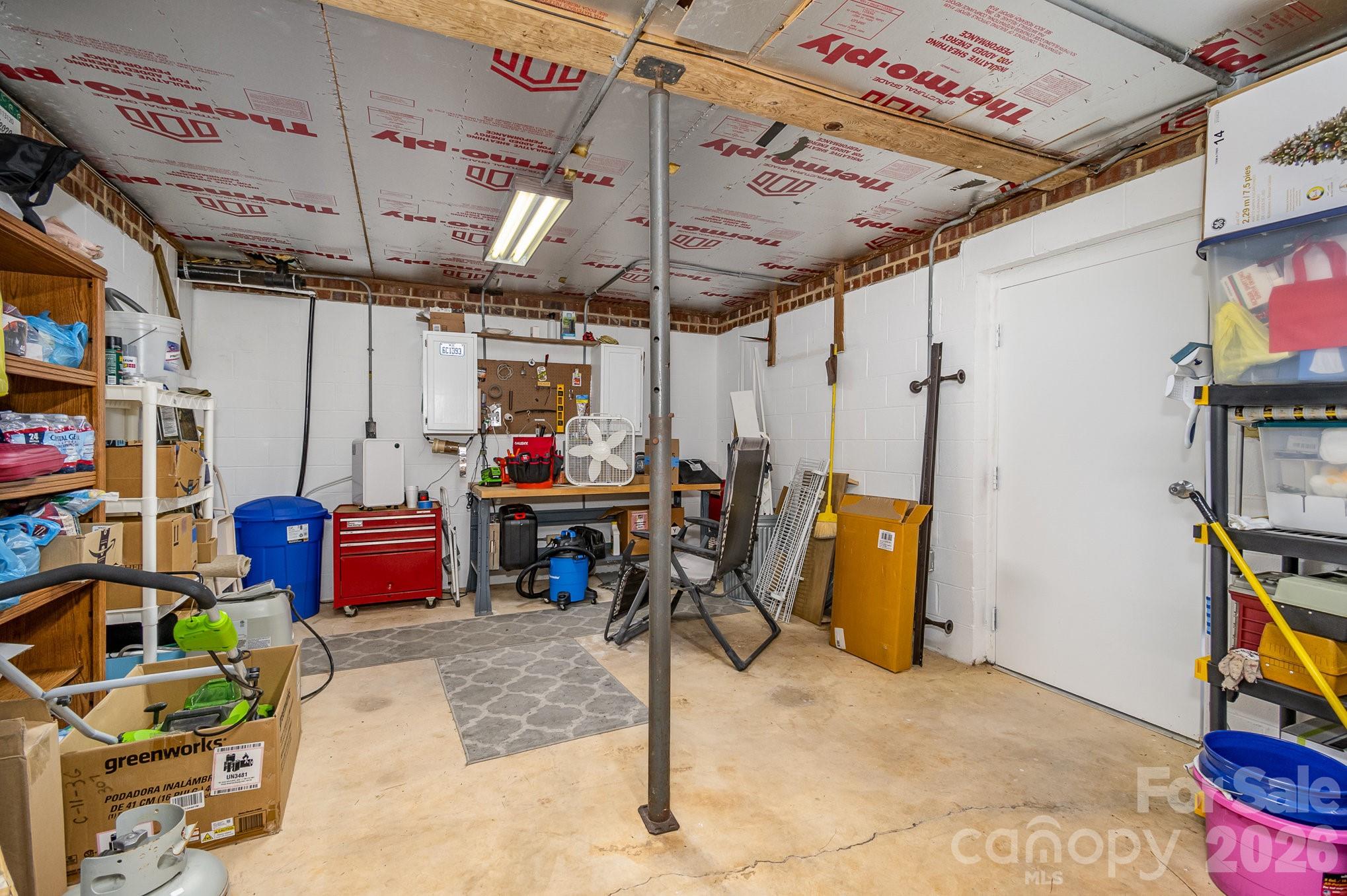 141 Badin Lake Road New London, NC 28127 - Photo 17 of 47 a view of storage and utility room