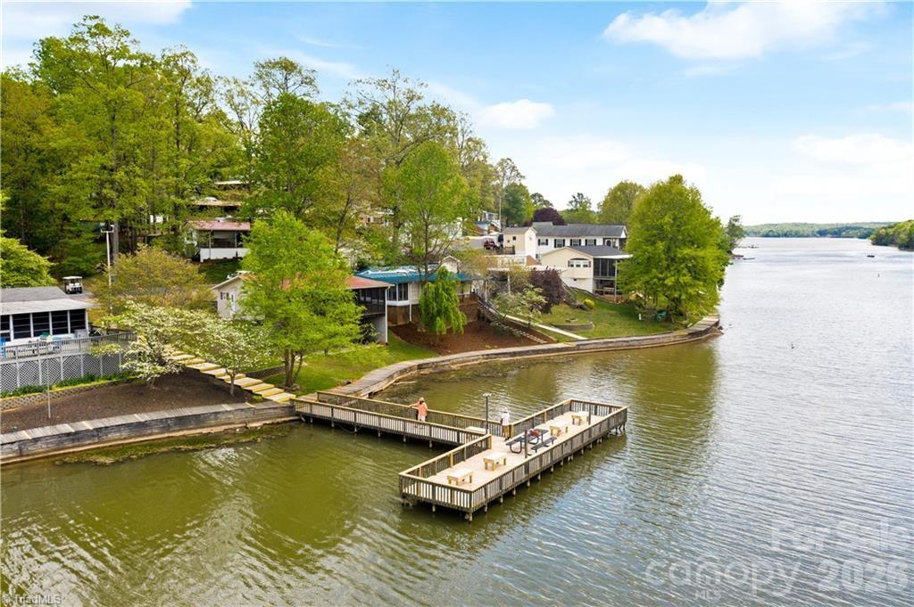 141 Badin Lake Road New London, NC 28127 - Photo 42 of 47 a view of a lake with houses
